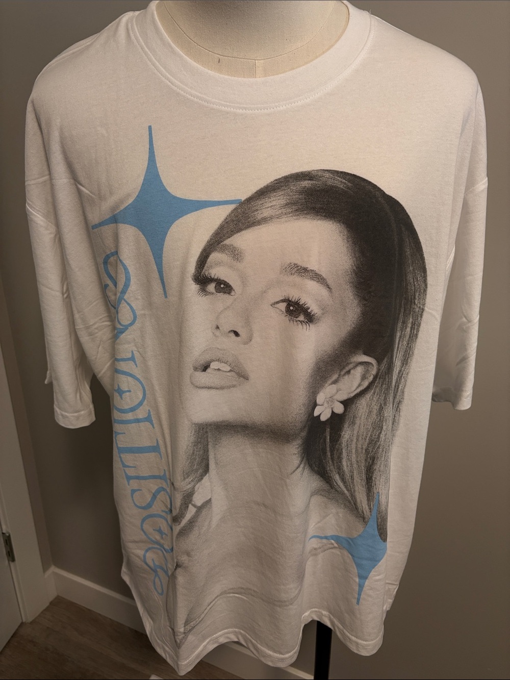 White Short-Sleeve Graphic Tee with Blue Accents Ariana Grande